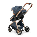 Poussette bébé 3 en 1 avec siège auto sécurisé et châssis doré pliable, solution complète de transport pour nourrisson