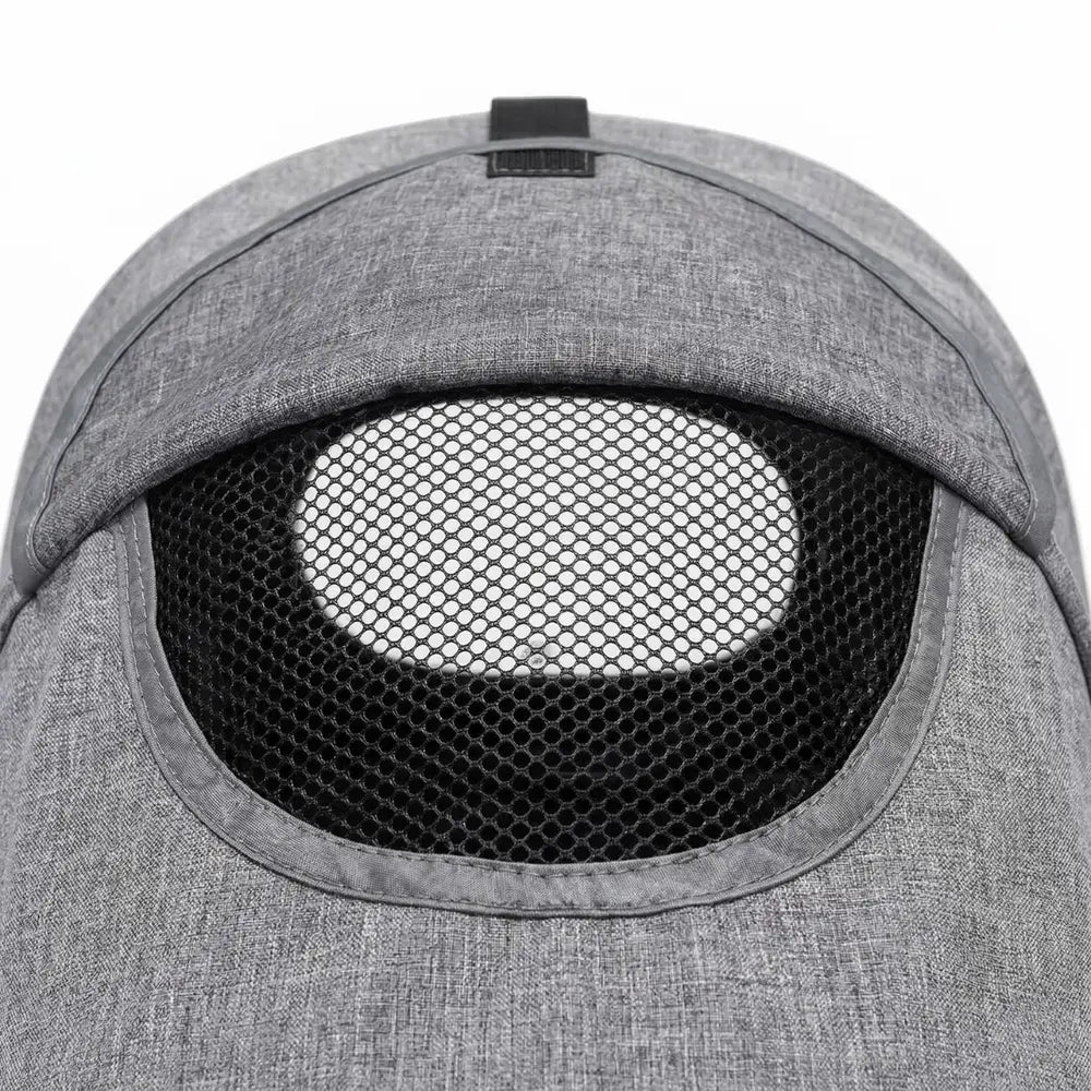 Fenêtre d’aération en filet sur capote poussette double permettant surveillance et ventilation optimale pour bébé